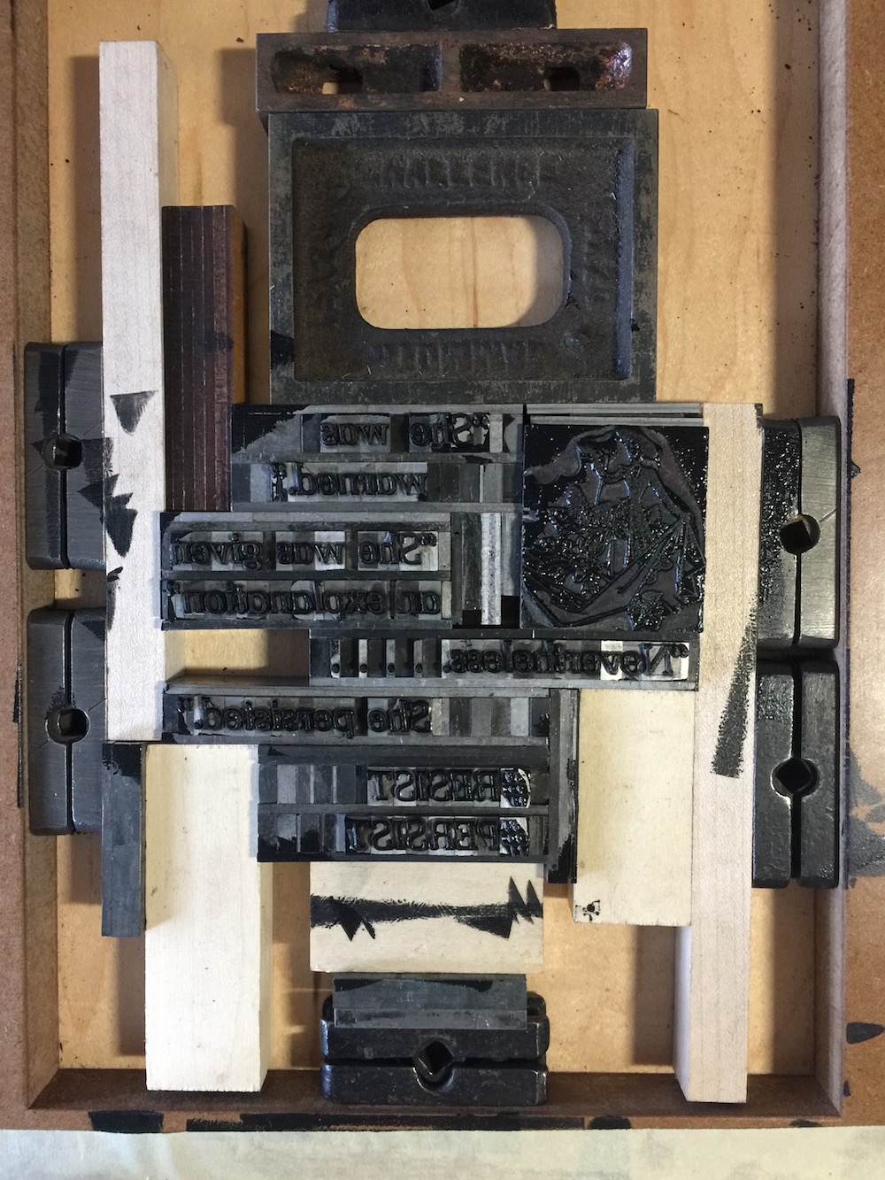 A printing project locked up in the frame using furniture and quoins.